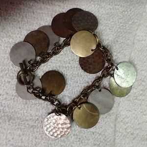 Silvertone goldtone chain toggle coin bracelet